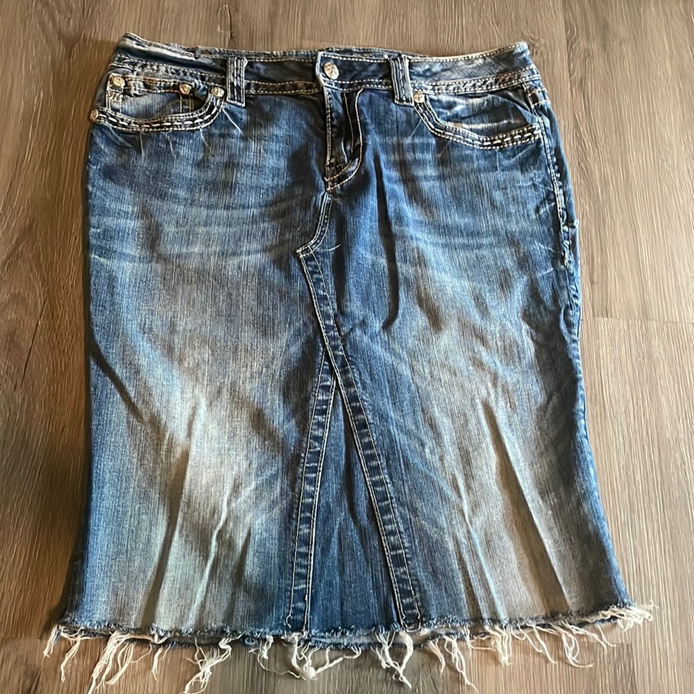 Ladies miss me skirt made from jeans, size 33, snug fit around booty, frayed hem